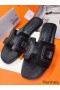 Hermes Oran Sandals In Black Leather With Stitched Detail