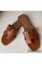 Hermes Oran Slide Sandals In Gold Swift Calfskin